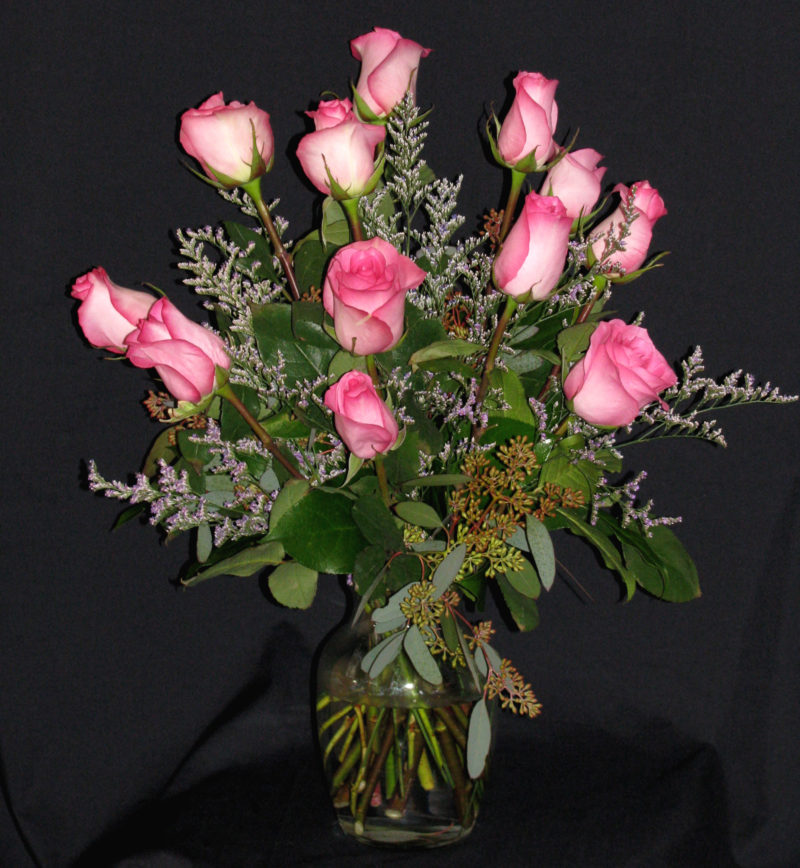 dozen-pink-roses-petals-on-prince-floral-arrangements-for-all-occasions